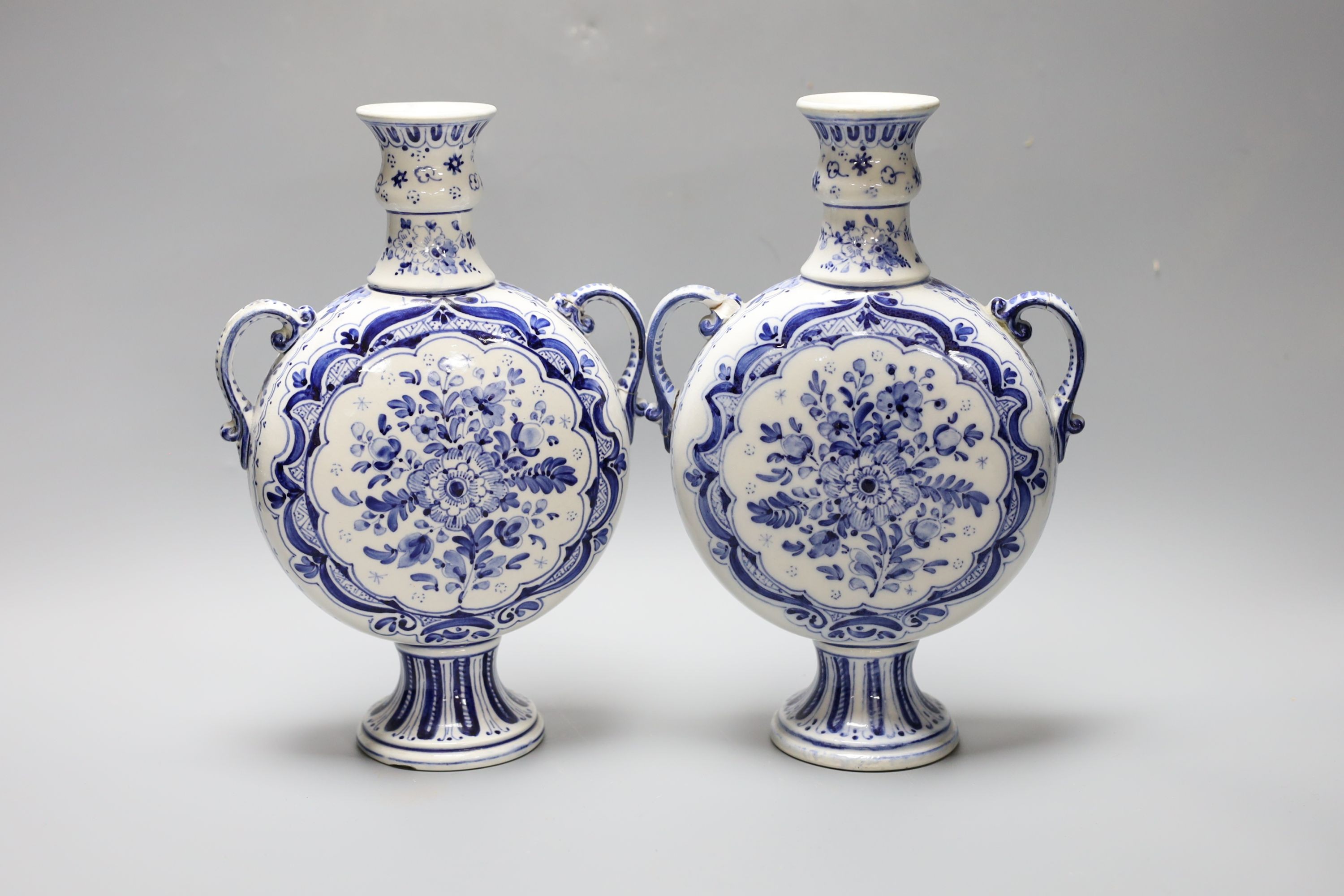 A pair of 19th century Delft vases 26cm